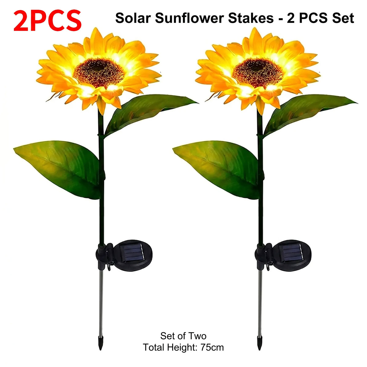 Solar sunflower lights glowing at night in a garden bed